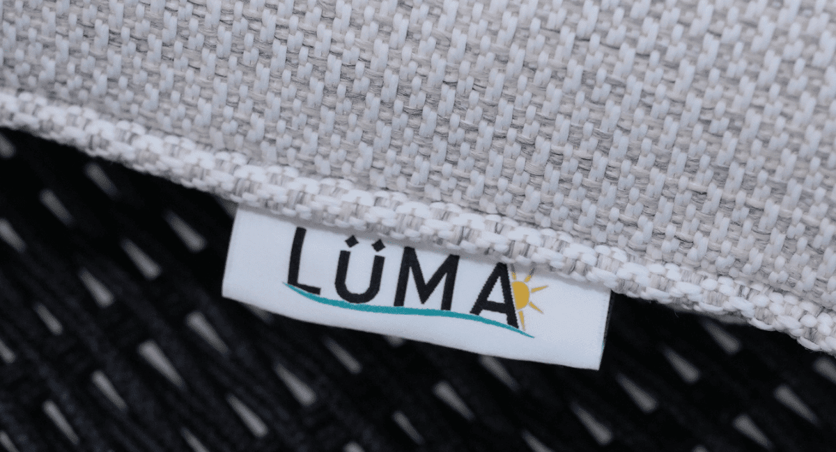 תגית המותג LÜMA על בד יוקרתי